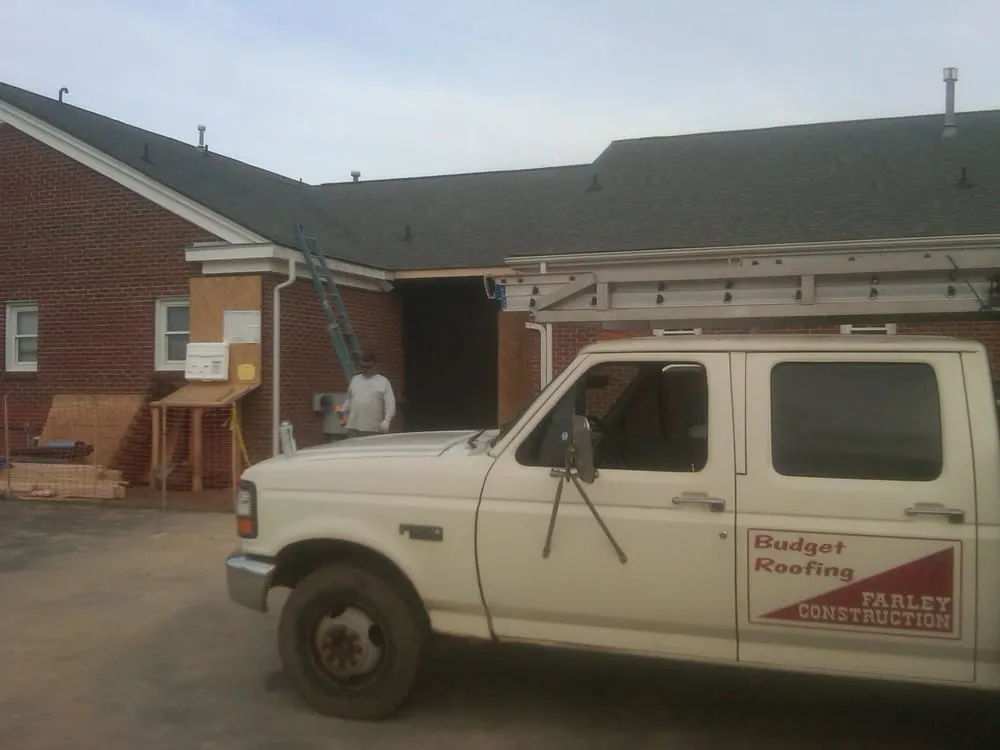 Slide of Budget Roofing