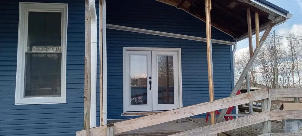 Slide of Buffalo Roofing & Restoration