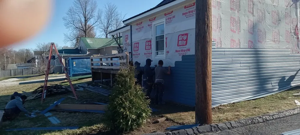 Slide of Buffalo Roofing & Restoration
