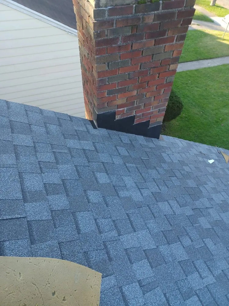 Slide of Buffalo Roofing & Restoration