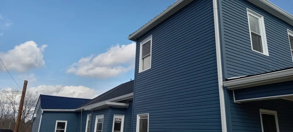 Slide of Buffalo Roofing & Restoration