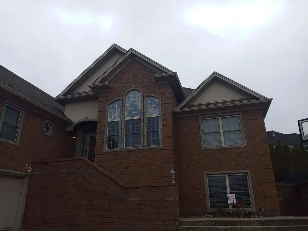 Slide of Buffalo Roofing & Restoration