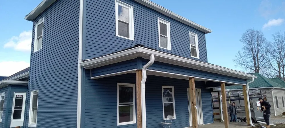 Slide of Buffalo Roofing & Restoration