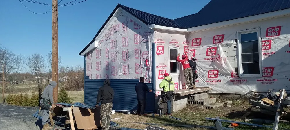 Slide of Buffalo Roofing & Restoration