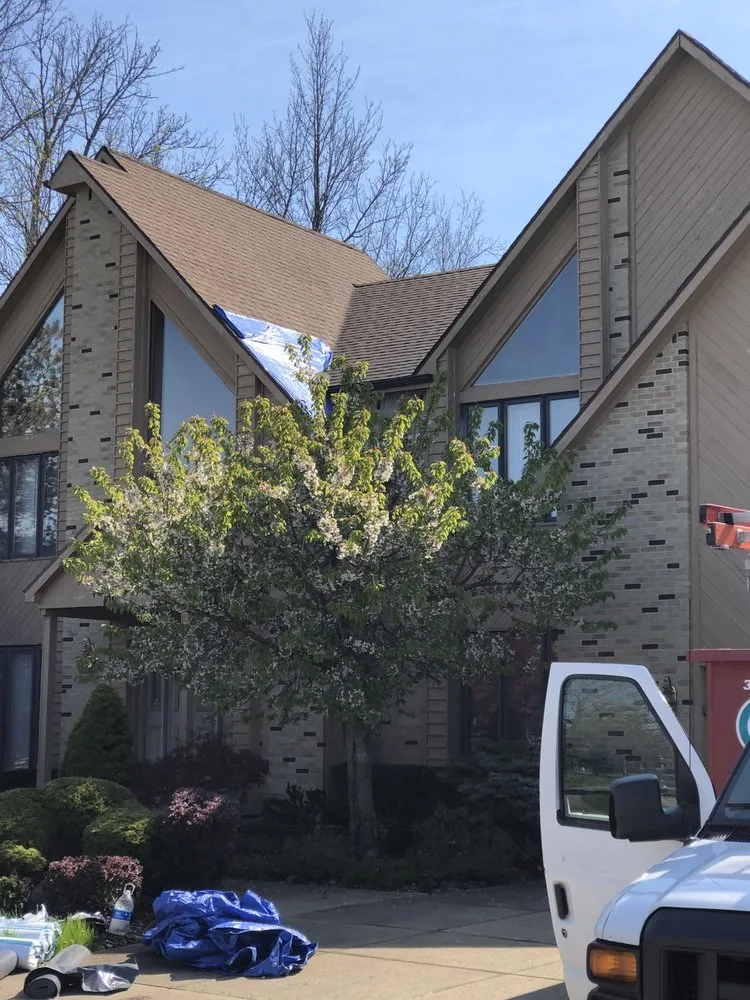 Slide of Buffalo's Best Roofing Company