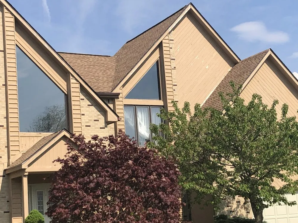 Slide of Buffalo's Best Roofing Company