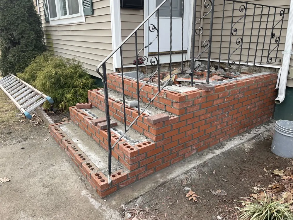 Slide of Build Smart Masonry & Roofing