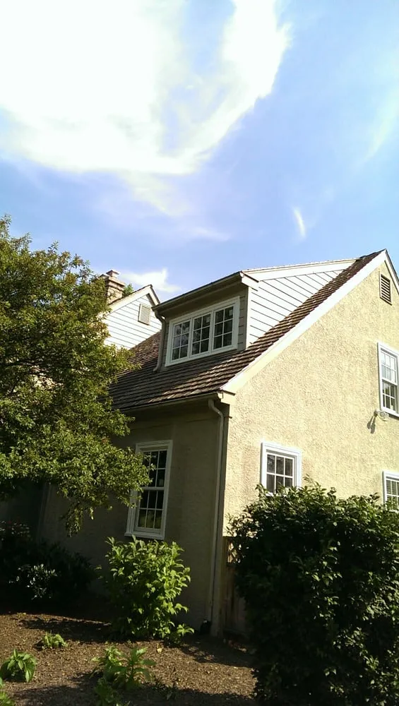 Expert flat roof repair after storm damage across Huntingdon Valley, PA - Building Memories Custom Contractors