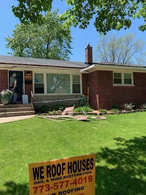 Slide of BUK Roofing