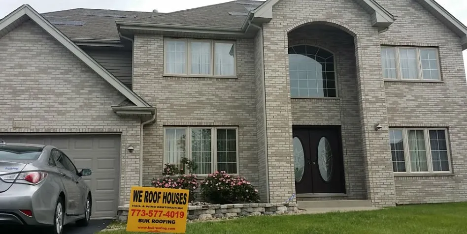 Slide of BUK Roofing