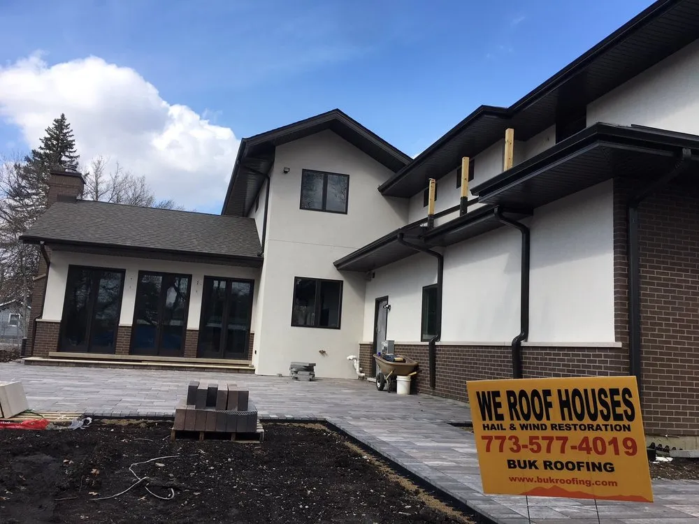 Slide of BUK Roofing