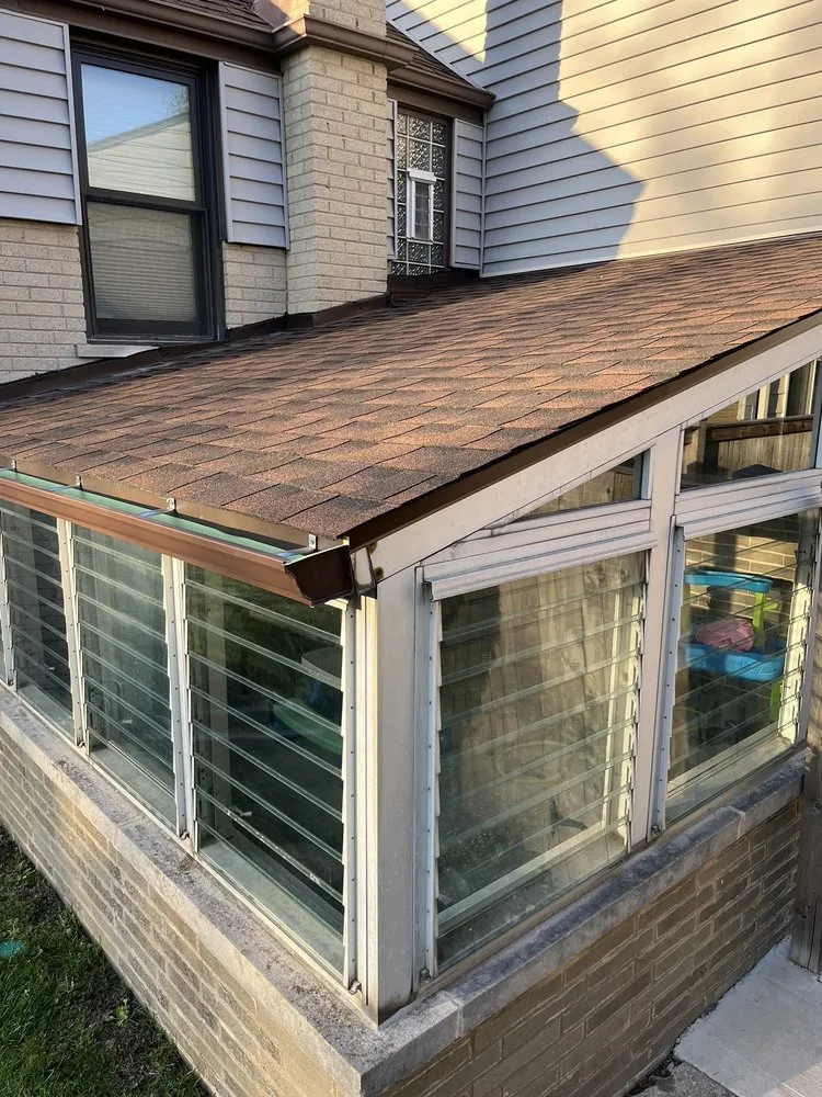 Slide of BUK Roofing