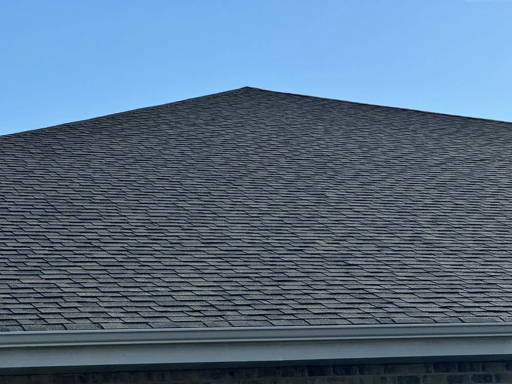 Slide of BUK Roofing