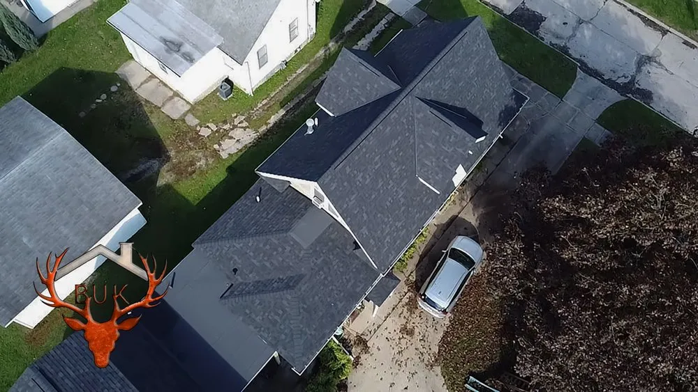 Slide of BUK Roofing