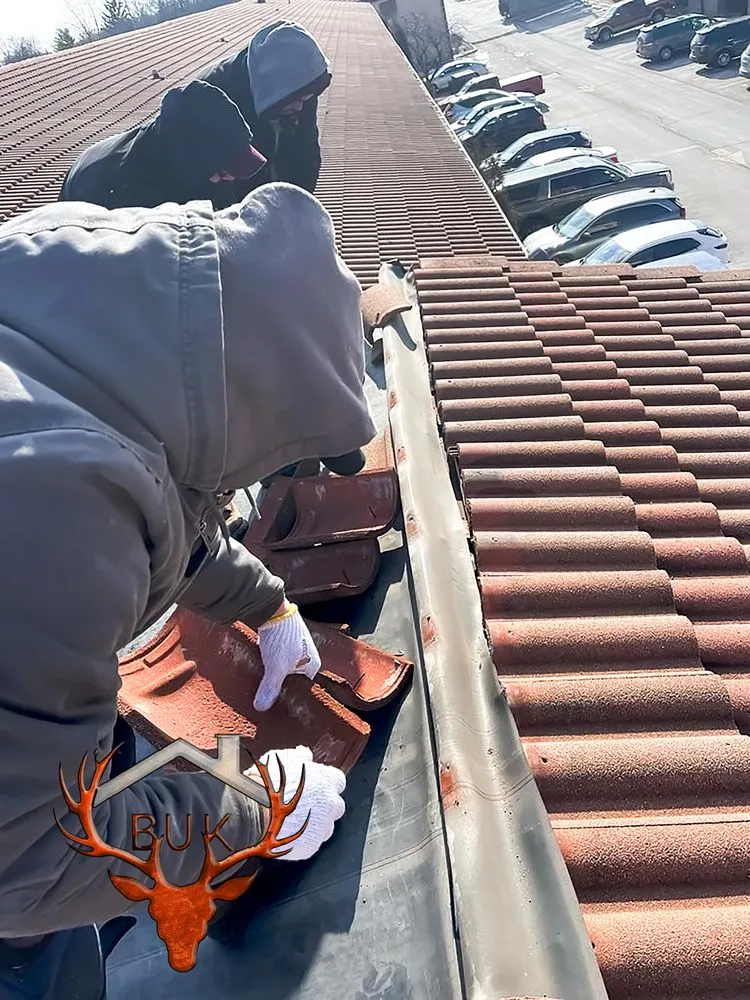 Slide of BUK Roofing