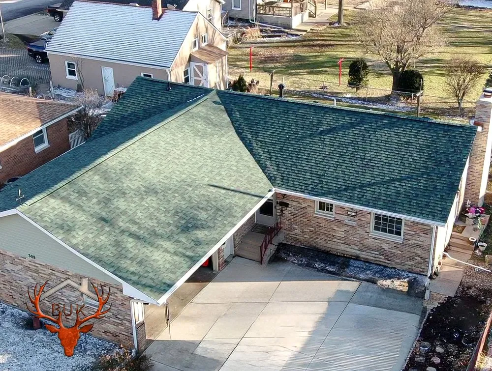 Slide of BUK Roofing