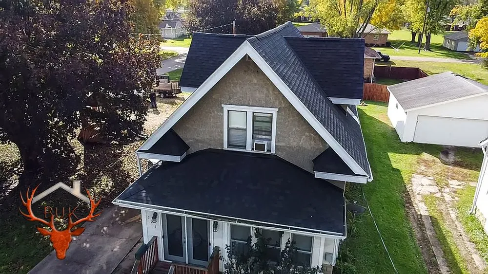 Slide of BUK Roofing