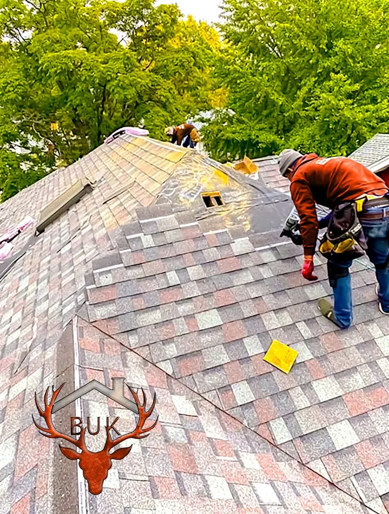 Slide of BUK Roofing