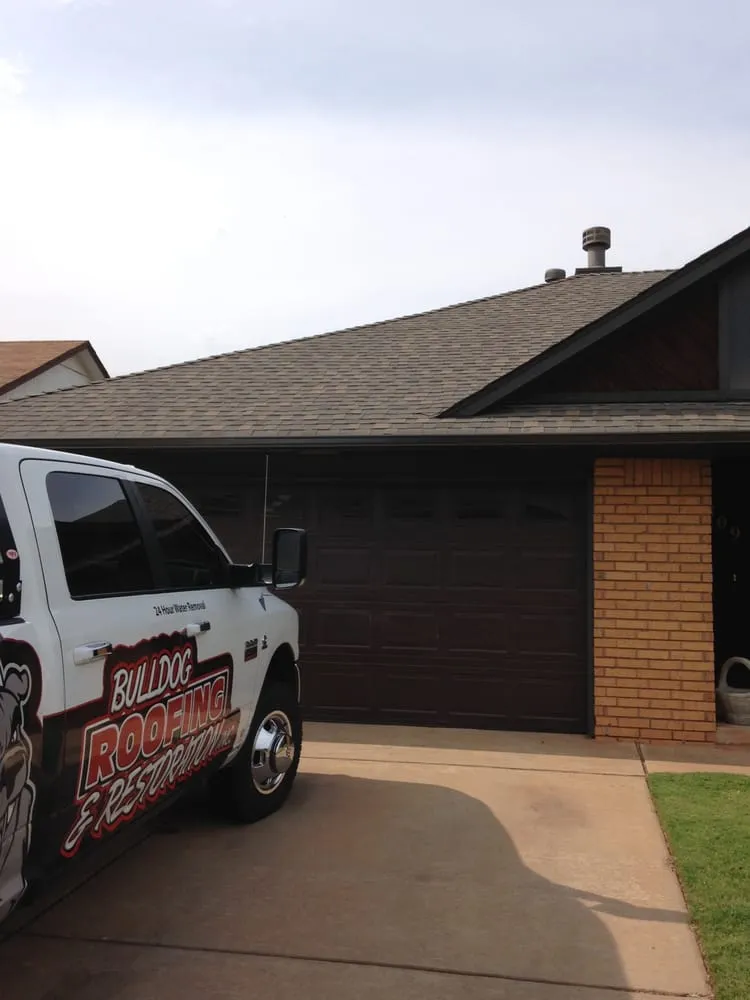 Slide of Bulldog Roofing and Restoration