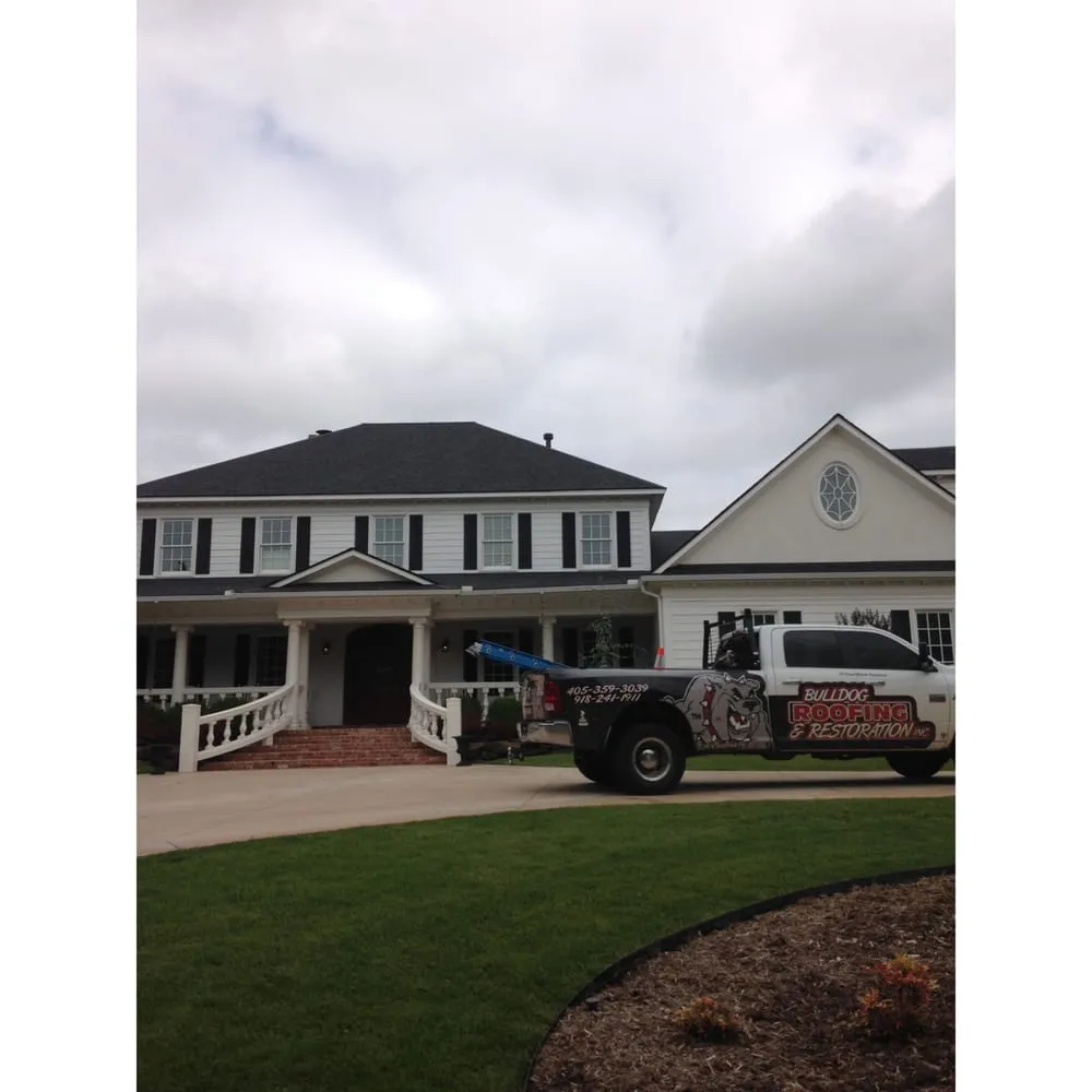 Slide of Bulldog Roofing and Restoration