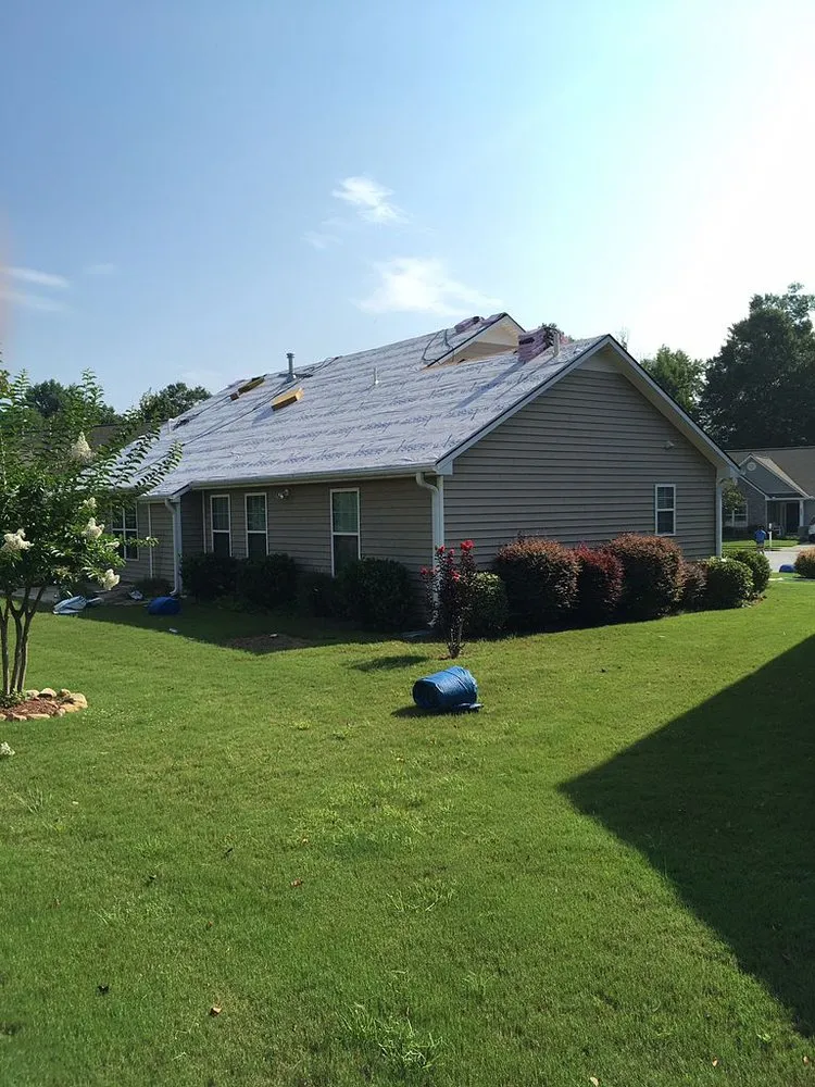 Slide of Bumblebee Roofing
