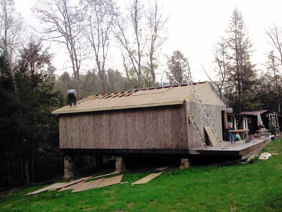 Expert shingle roofing service after storm damage in Marlinton, WV by Burgess Construction