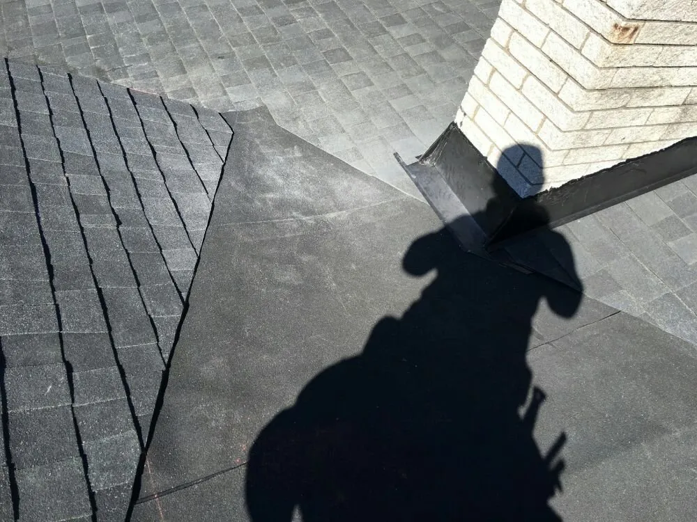 Slide of Burke's Roofing