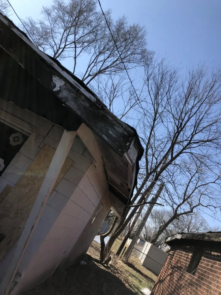 Slide of Burns Roofing and Masonary