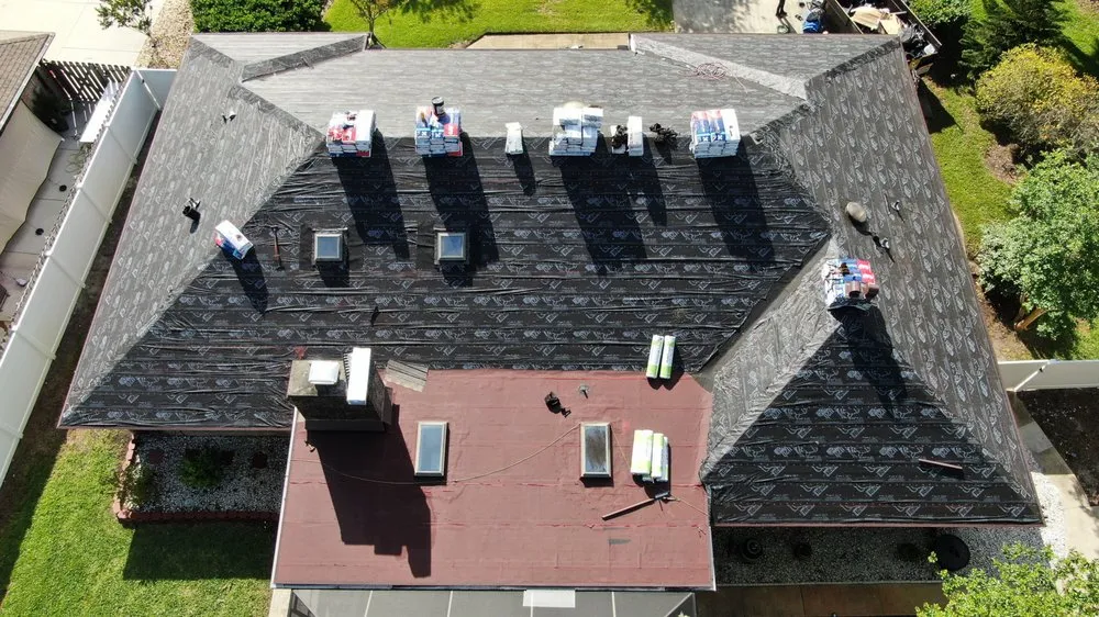 Slide of Burtis Roofing