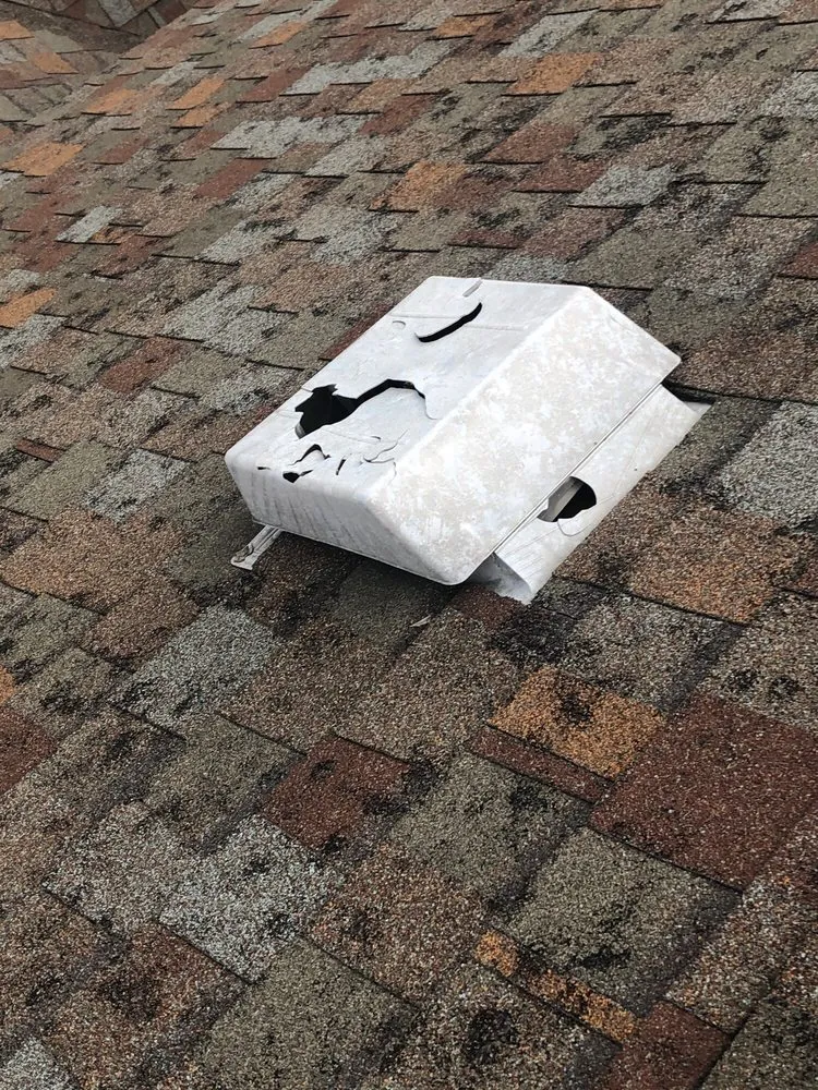 Slide of Burton Hughes - New View Roofing