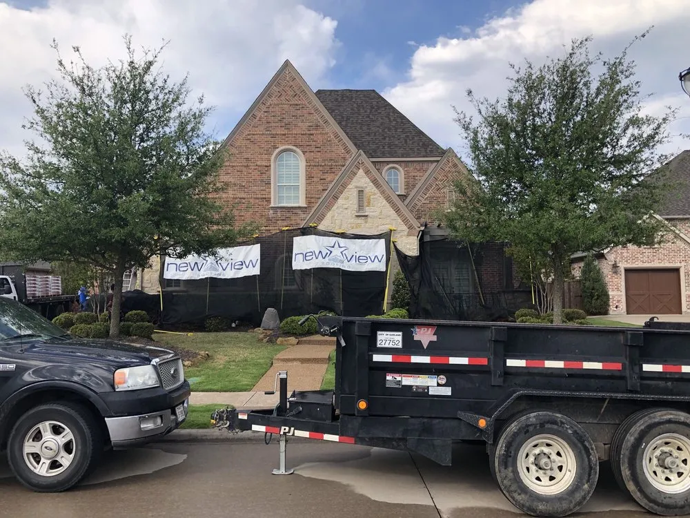 Slide of Burton Hughes - New View Roofing