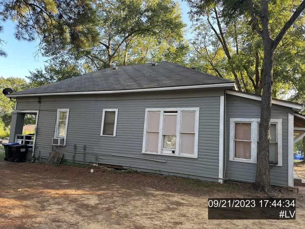 Slide of Busse Roofing