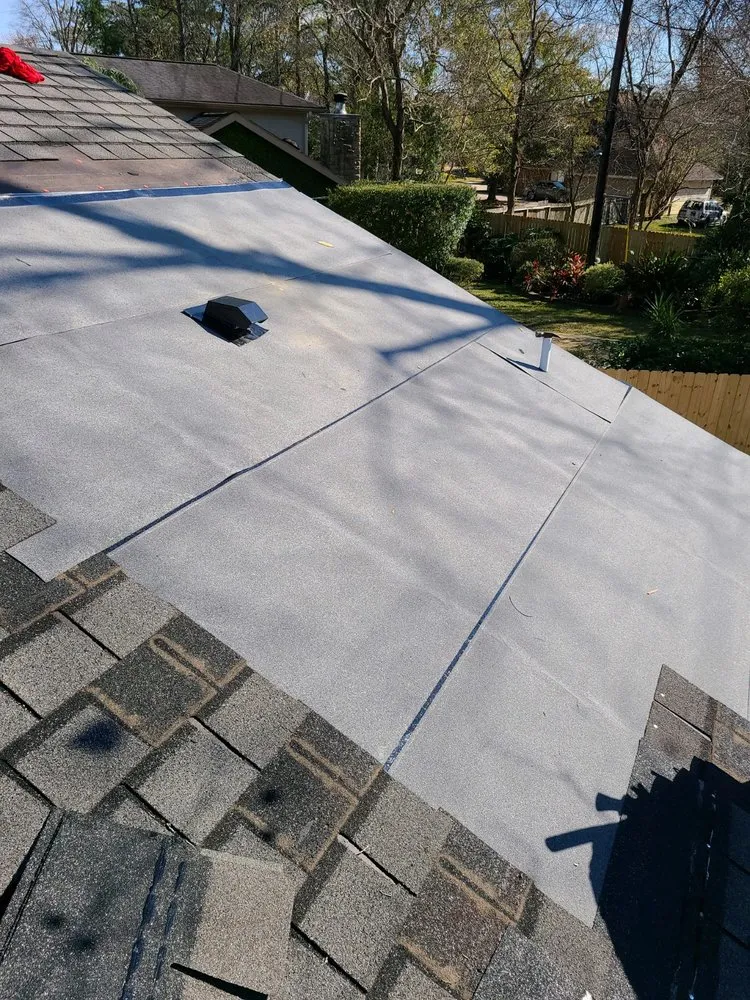 Slide of Bustamante Roofing and Construction