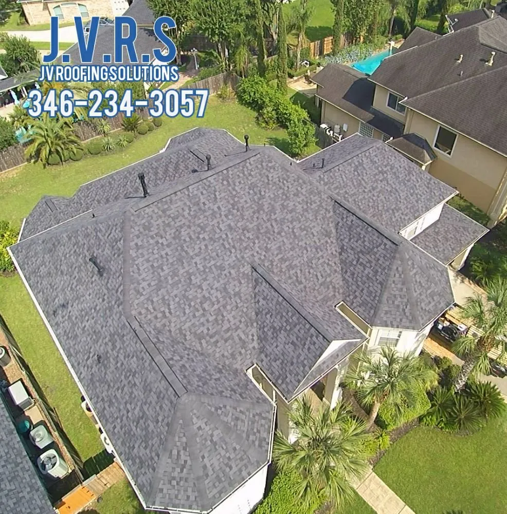 Slide of Bustamante Roofing and Construction