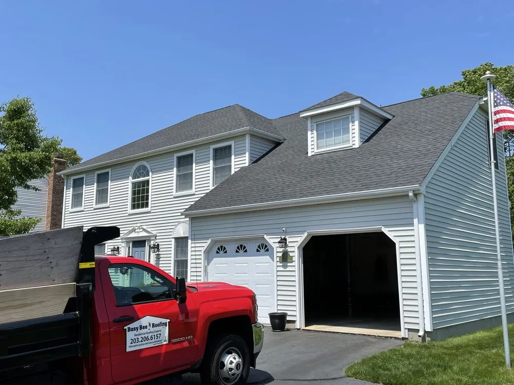 Slide of Busy Bee Roofing