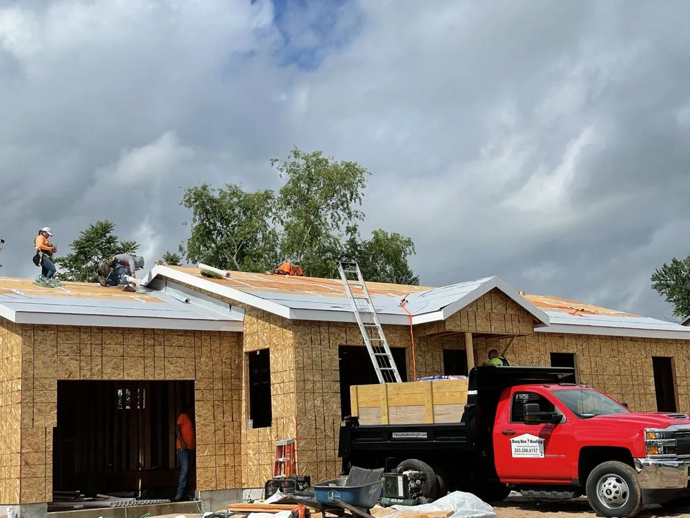 Slide of Busy Bee Roofing