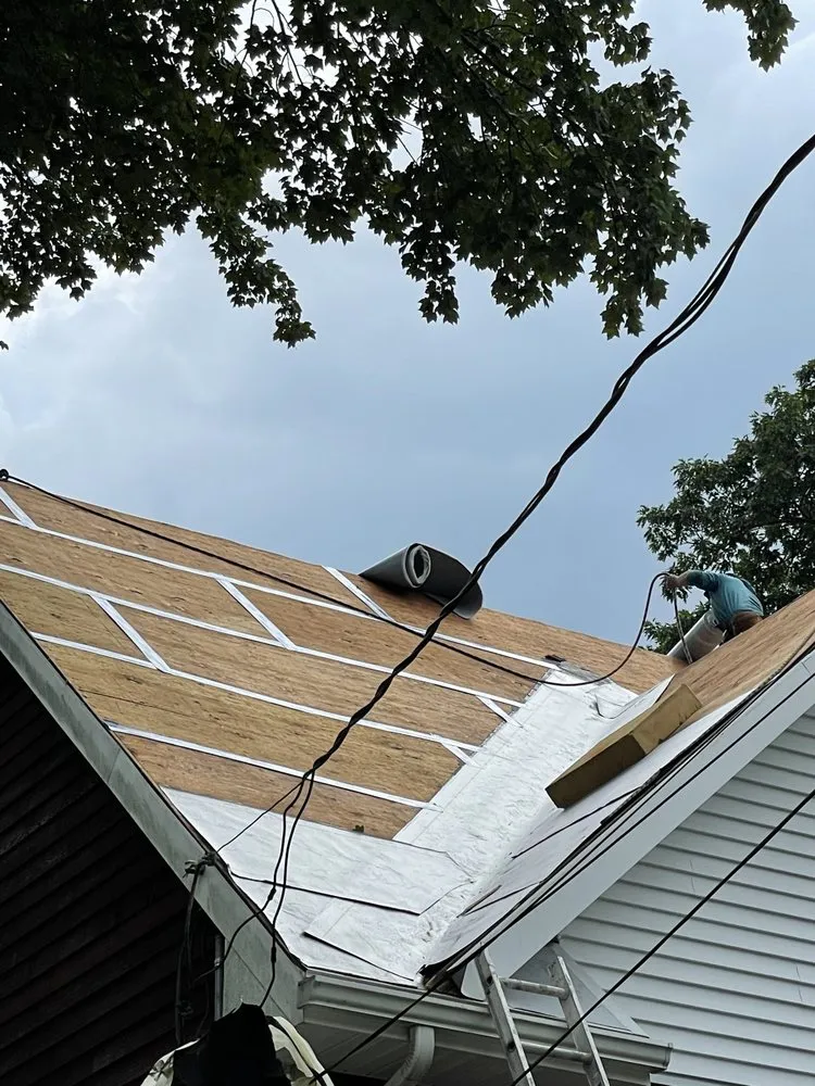 Slide of Busy Bee Roofing