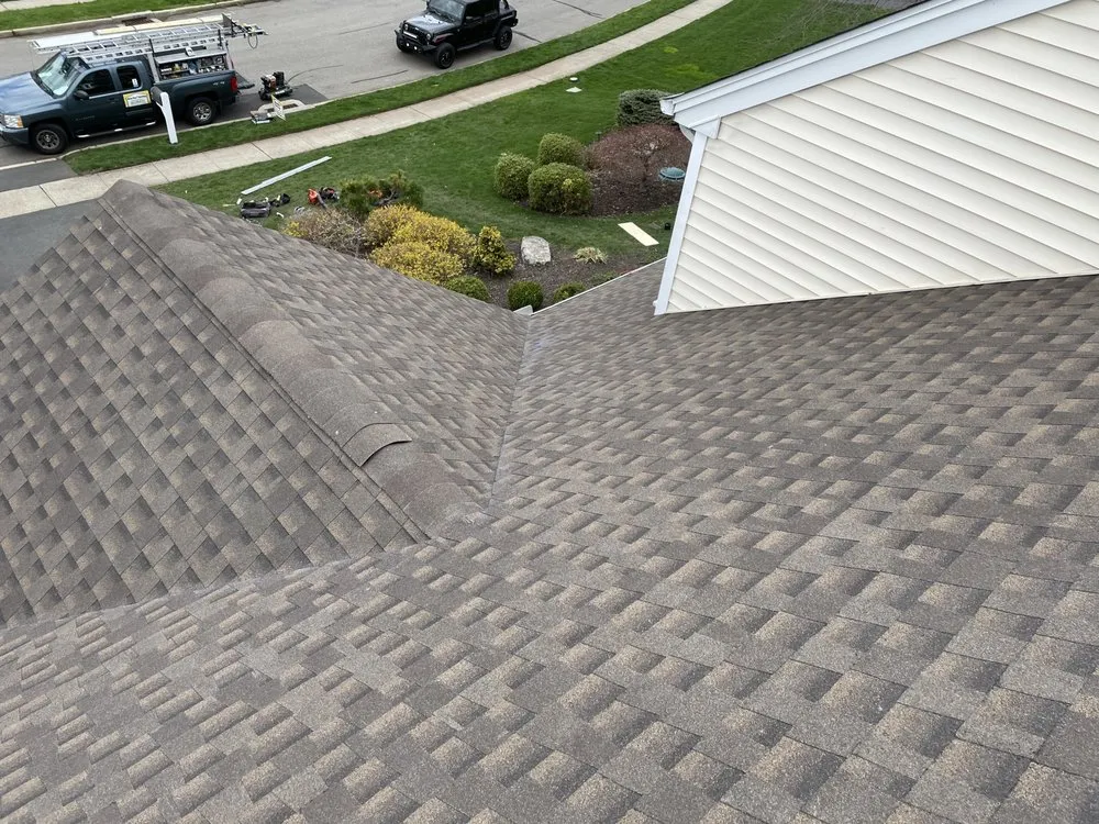 Slide of Busy Bee Roofing