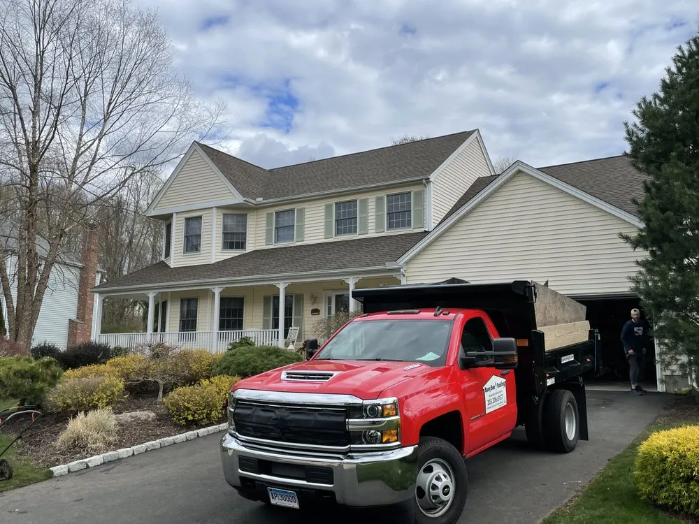 Slide of Busy Bee Roofing