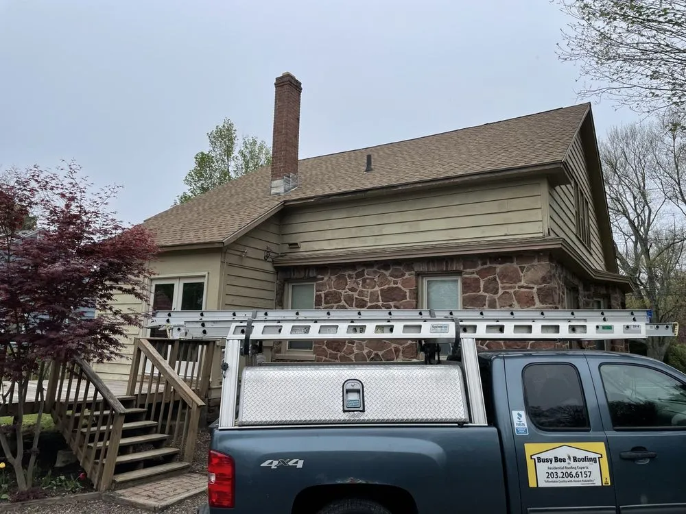 Slide of Busy Bee Roofing