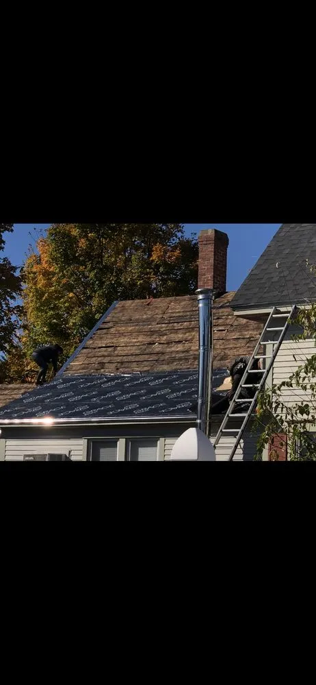 Slide of But Roofing and Siding