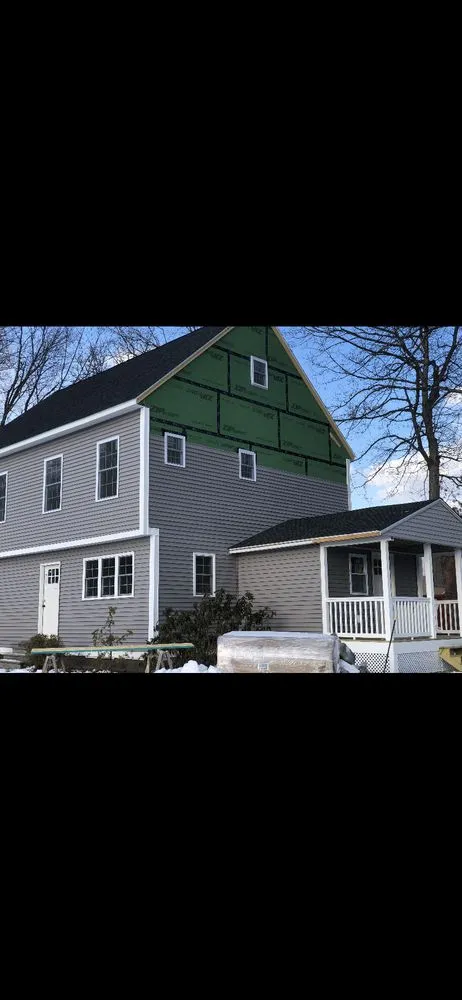 Slide of But Roofing and Siding