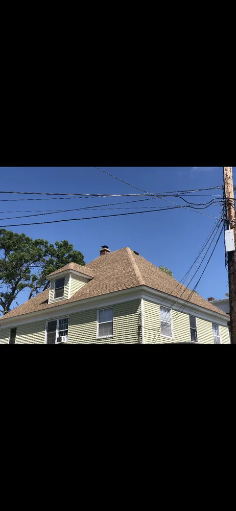 Slide of But Roofing and Siding