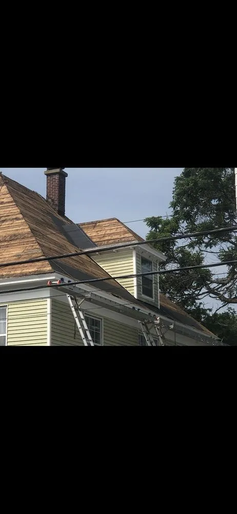 Slide of But Roofing and Siding