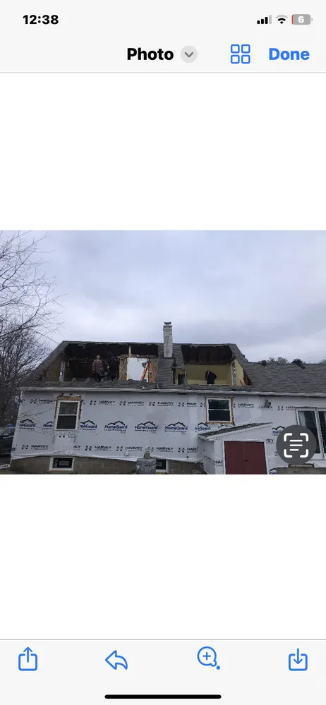 Slide of But Roofing and Siding