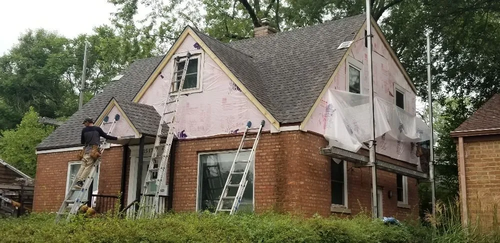 Slide of Butler Roofing