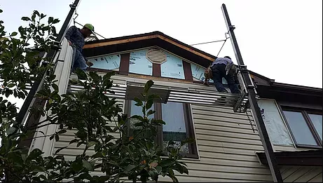 Slide of Butler Roofing