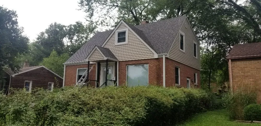 Slide of Butler Roofing