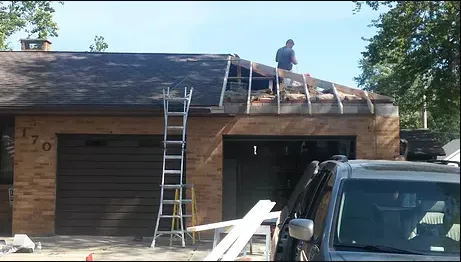 Slide of Butler Roofing