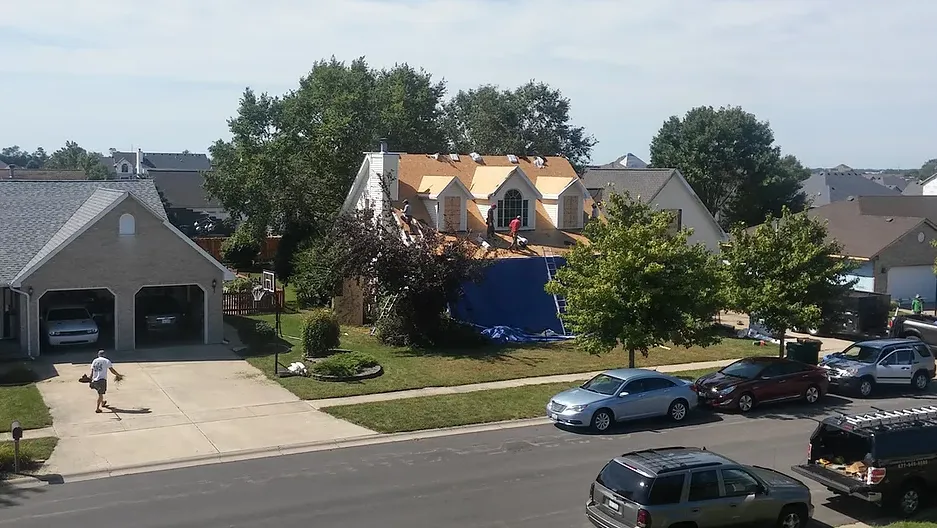 Slide of Butler Roofing